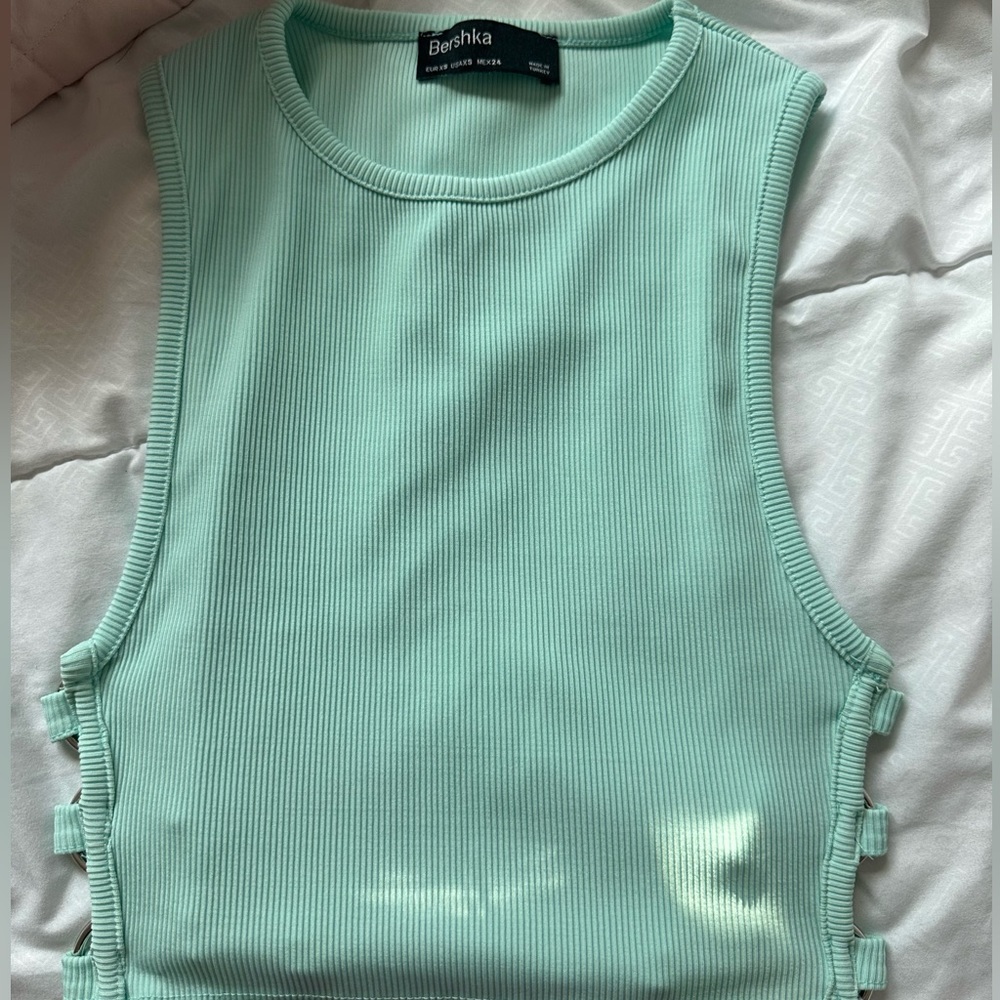 Bershka teal crop top with metal openings on the sides